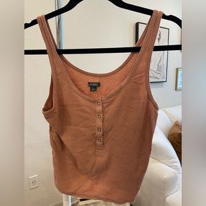 Cute tank top with snap details!